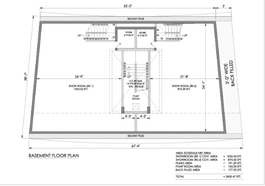 Screenshot 2026-08-11 153845 - IKR Development Basement floor plan with a central stairwell, two side show rooms, and a pump room, including labeled dimensions and surrounding walls.